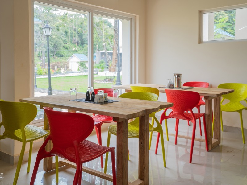 Dining table with scenic transparent window view at MSB Silver Spring resort