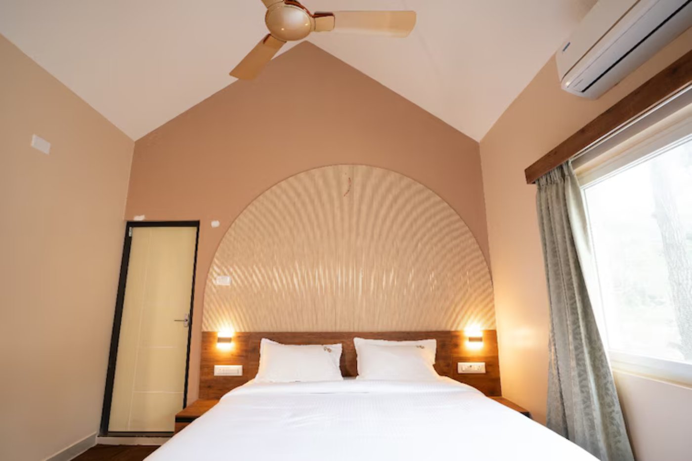 Deluxe executive room interior at a luxury resort in Yelagiri Hills MSB