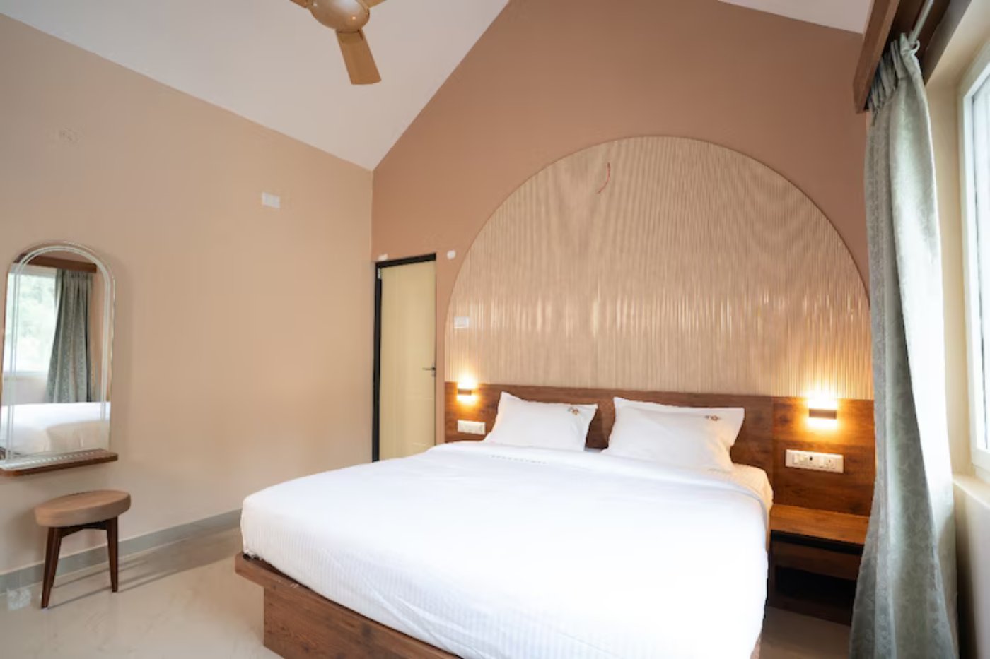 VIP suite room with queen bed at a luxury resort in Yelagiri Hills MSB